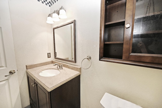 110 N Terry Ave, Clovis, CA 93612 - bathroom featuring vanity and a textured wall