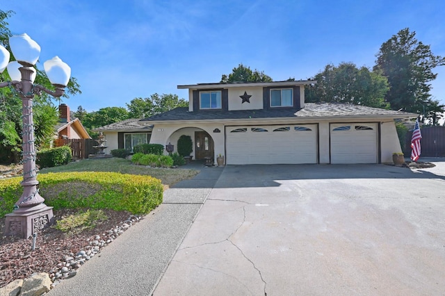 110 N Terry Ave, Clovis, CA 93612 - traditional-style home with stucco siding, driveway, and roof with shingles