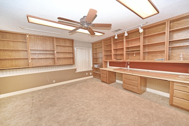 110 N Terry Ave, Clovis, CA 93612 - unfurnished office featuring built in study area, carpet, and a ceiling fan