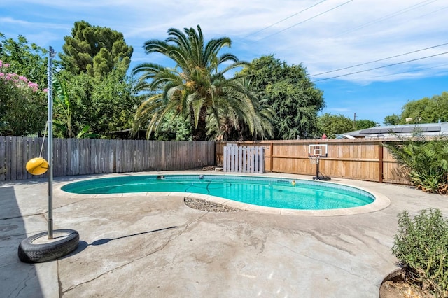 3635 N Hughes, Fresno, CA 93705 - view of swimming pool with a fenced backyard and a patio