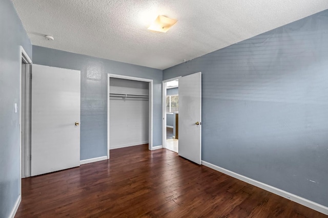 3635 N Hughes, Fresno, CA 93705 - unfurnished bedroom with a textured ceiling, a closet, and wood finished floors