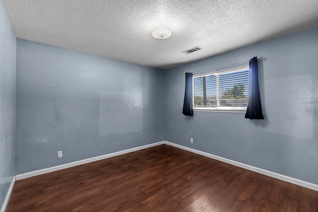 3635 N Hughes, Fresno, CA 93705 - spare room featuring wood finished floors and a textured ceiling