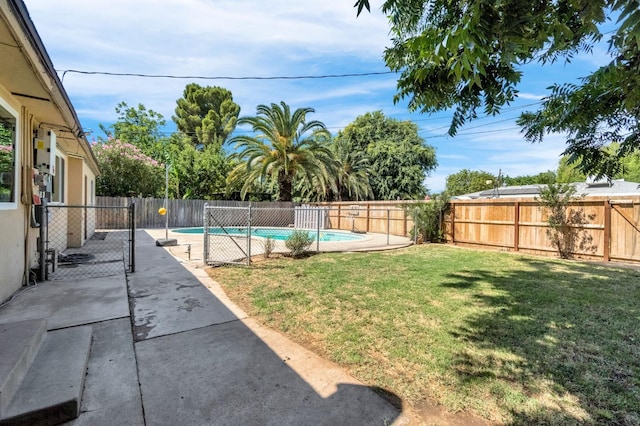 3635 N Hughes, Fresno, CA 93705 - fenced backyard with a patio