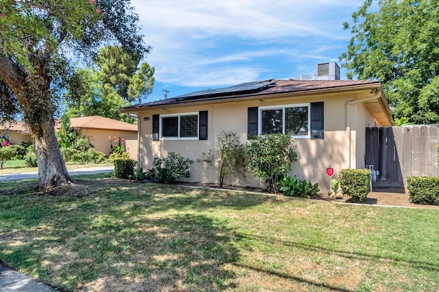 3635 N Hughes, Fresno, CA 93705 - view of front of house with stucco siding and solar panels