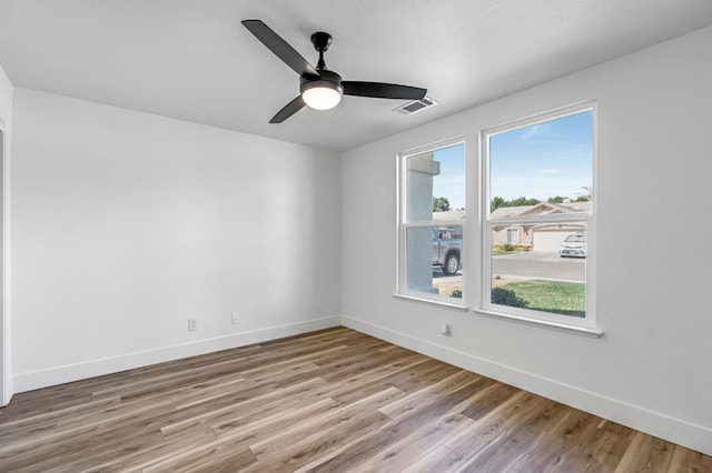 1033 Cypress Ct, Madera, CA 93637 - spare room with wood finished floors and ceiling fan