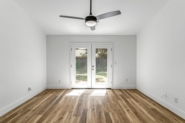 1033 Cypress Ct, Madera, CA 93637 - unfurnished room with french doors, ceiling fan, and wood finished floors