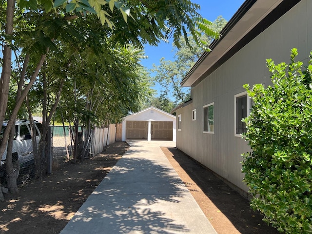 2405 E White Ave, Fresno, CA 93701 - view of home's exterior with a garage and an outbuilding