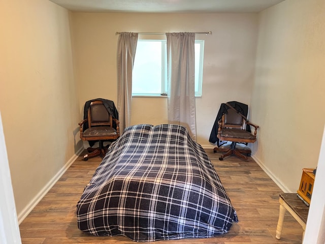 2405 E White Ave, Fresno, CA 93701 - bedroom with wood finished floors and baseboards