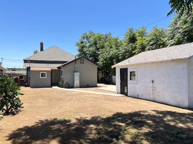 2405 E White Ave, Fresno, CA 93701 - back of house featuring an outbuilding and a shingled roof