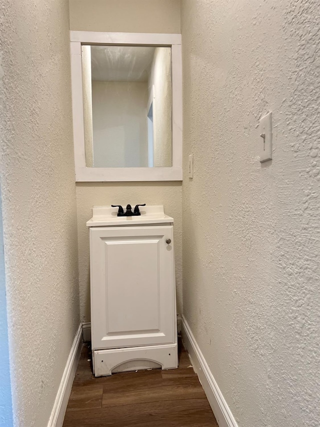 2405 E White Ave, Fresno, CA 93701 - detailed view of a textured wall and wood finished floors