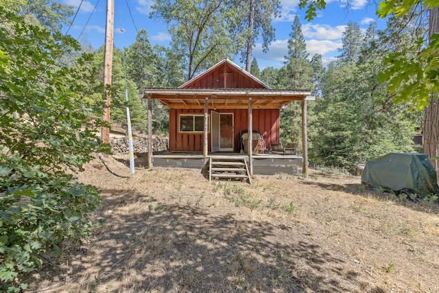 48675 Todd Eymann Rd, Miramonte, CA 93641 - view of front of home featuring board and batten siding and covered porch