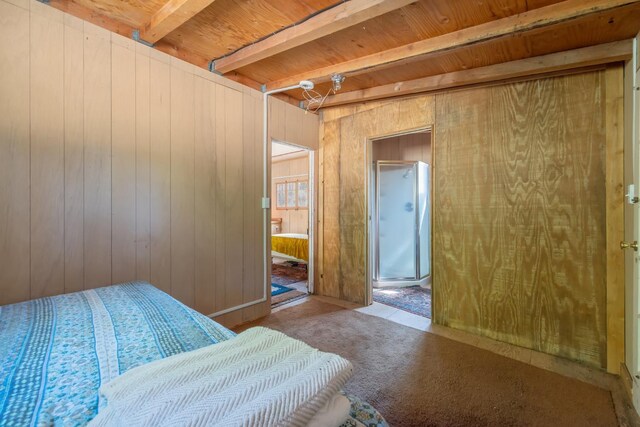 48675 Todd Eymann Rd, Miramonte, CA 93641 - carpeted bedroom featuring wood walls and a wood ceiling with exposed beams