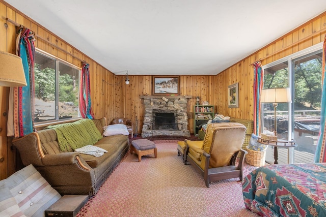 48675 Todd Eymann Rd, Miramonte, CA 93641 - living room with plenty of natural light, carpet floors, wooden walls, and a fireplace