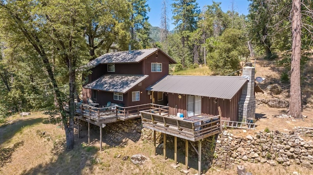 48675 Todd Eymann Rd, Miramonte, CA 93641 - back of house featuring a wooden deck and a chimney