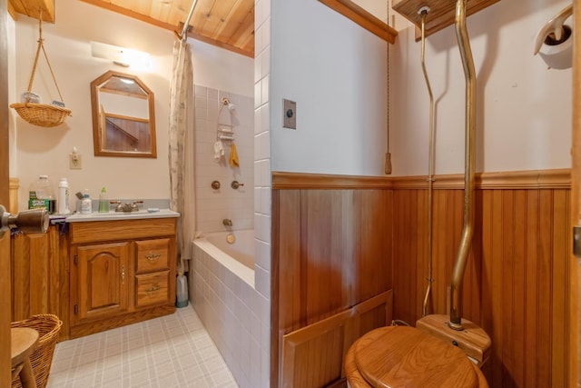 48675 Todd Eymann Rd, Miramonte, CA 93641 - bathroom with vanity, shower / bath combination with curtain, and a wainscoted wall