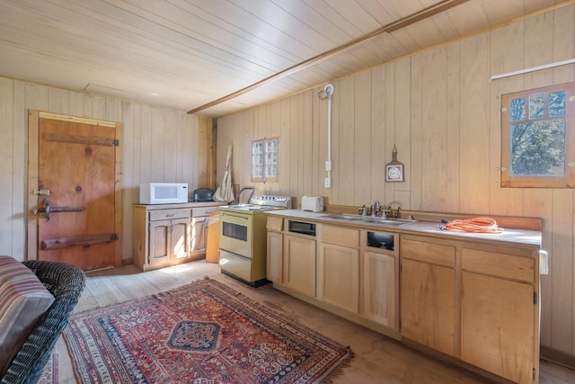 48675 Todd Eymann Rd, Miramonte, CA 93641 - kitchen with white appliances, wood walls, wooden ceiling, and light countertops