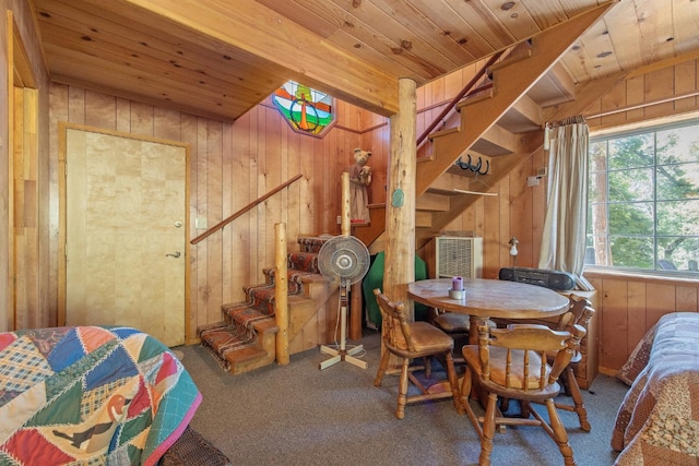 48675 Todd Eymann Rd, Miramonte, CA 93641 - carpeted dining space with wood walls, stairway, and wooden ceiling