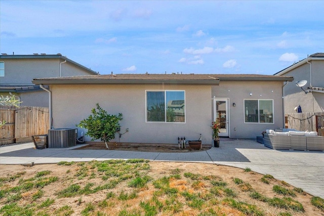 627 S Kandarian Ave, Fowler, CA 93625 - view of front of property featuring an outdoor hangout area, a patio area, and stucco siding
