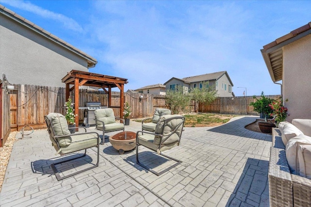 627 S Kandarian Ave, Fowler, CA 93625 - fenced backyard with an outdoor living space with a fire pit, a patio area, a pergola, and area for grilling