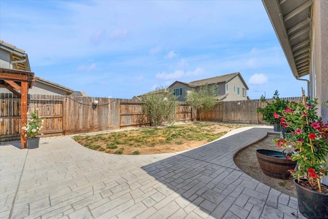 627 S Kandarian Ave, Fowler, CA 93625 - fenced backyard with a patio