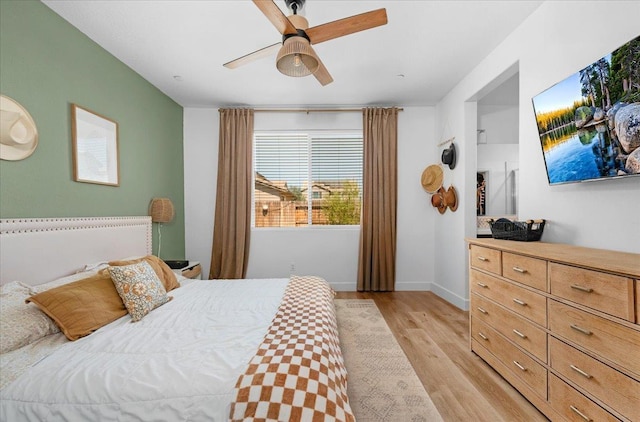627 S Kandarian Ave, Fowler, CA 93625 - bedroom with light wood-style floors and a ceiling fan
