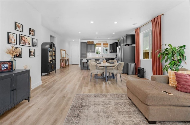 627 S Kandarian Ave, Fowler, CA 93625 - living room featuring light wood-type flooring and recessed lighting