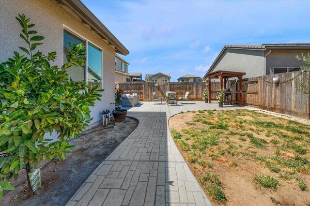 627 S Kandarian Ave, Fowler, CA 93625 - fenced backyard featuring a patio