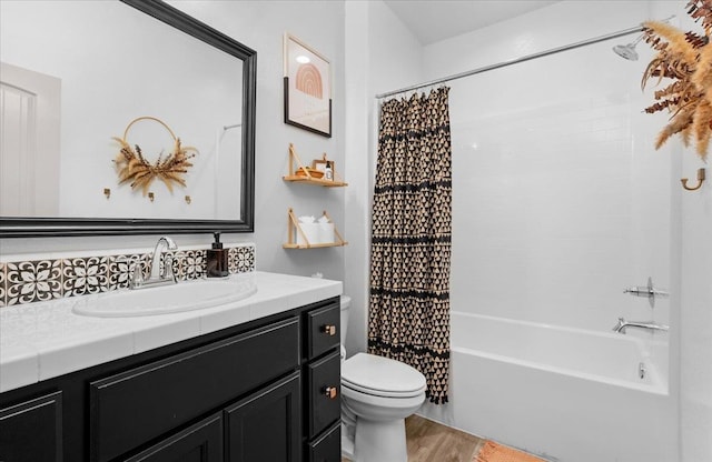 627 S Kandarian Ave, Fowler, CA 93625 - bathroom with vanity, shower / tub combo, and wood finished floors