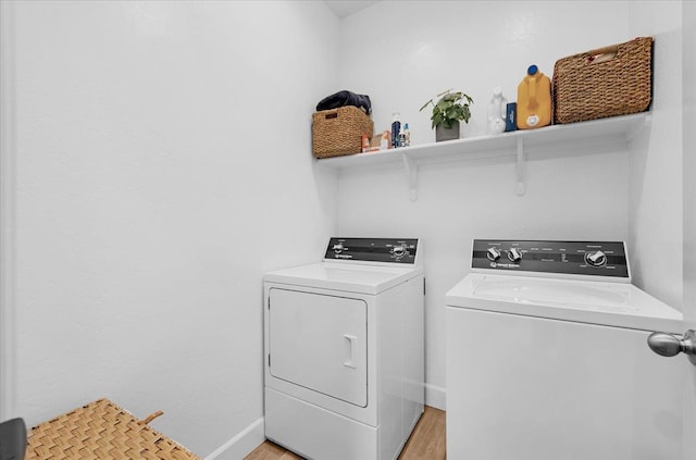 627 S Kandarian Ave, Fowler, CA 93625 - laundry room with independent washer and dryer and light wood finished floors