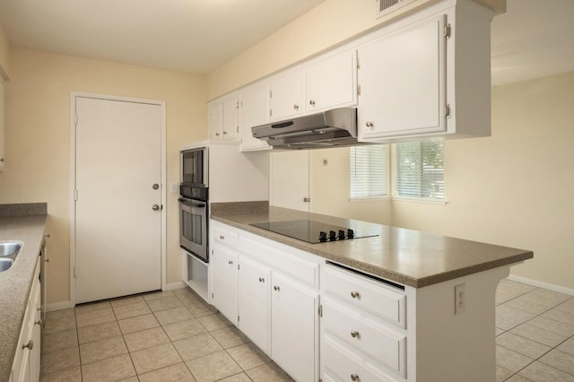 1763 Norwich Ave, Clovis, CA 93611 - kitchen with black appliances, under cabinet range hood, light tile patterned floors, a peninsula, and white cabinetry