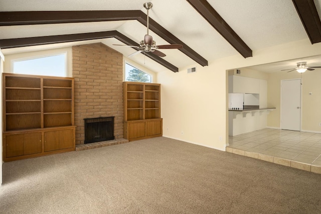 1763 Norwich Ave, Clovis, CA 93611 - unfurnished living room with a ceiling fan, carpet floors, a brick fireplace, and tile patterned flooring