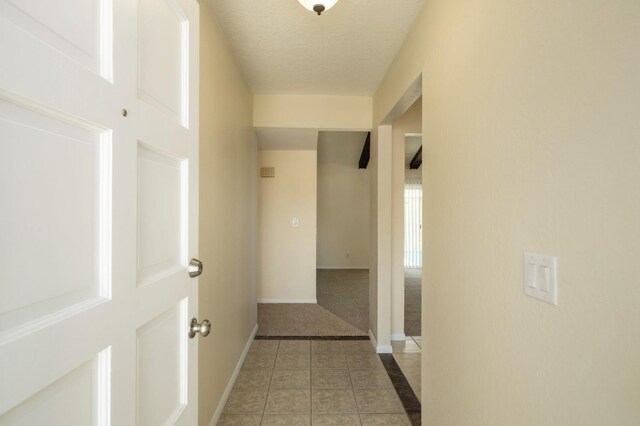 1763 Norwich Ave, Clovis, CA 93611 - hallway with light tile patterned floors and baseboards