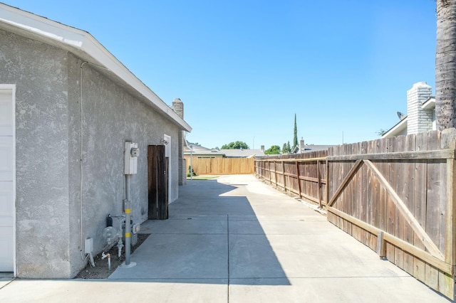 1763 Norwich Ave, Clovis, CA 93611 - fenced backyard with a patio