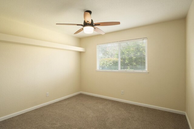 1763 Norwich Ave, Clovis, CA 93611 - carpeted empty room with a ceiling fan and baseboards