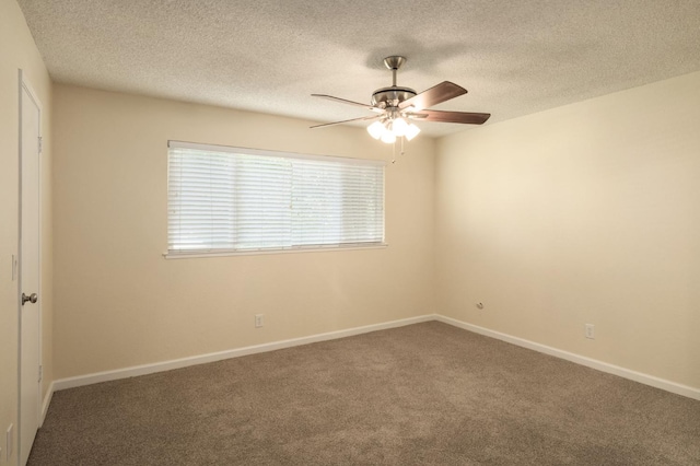 1763 Norwich Ave, Clovis, CA 93611 - spare room with a ceiling fan, carpet, and a textured ceiling