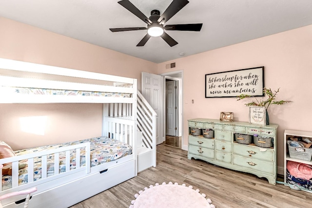 3377 N Bethel Ave, Sanger, CA 93657 - bedroom with light wood finished floors and ceiling fan