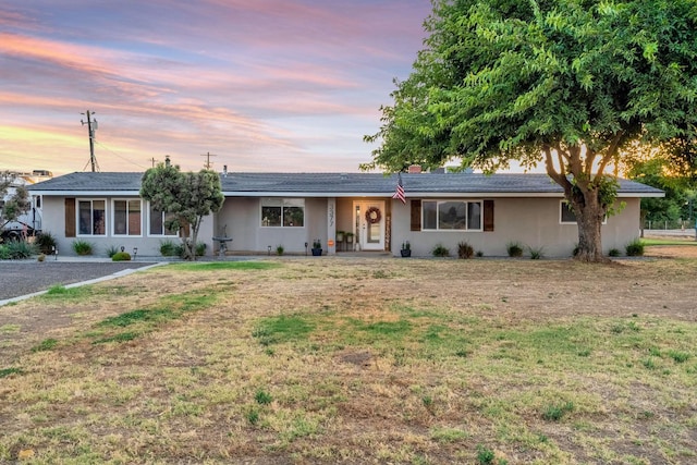 3377 N Bethel Ave, Sanger, CA 93657 - ranch-style home featuring a front lawn and stucco siding