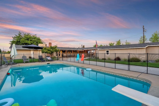 3377 N Bethel Ave, Sanger, CA 93657 - pool at dusk with a diving board