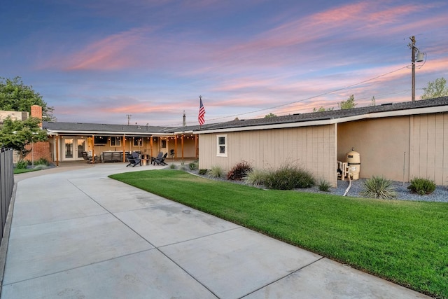 3377 N Bethel Ave, Sanger, CA 93657 - view of front facade featuring a front yard, french doors, and a patio area