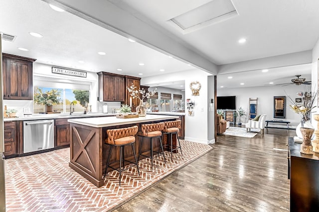 3377 N Bethel Ave, Sanger, CA 93657 - kitchen featuring dishwasher, light countertops, a kitchen island, recessed lighting, and open floor plan
