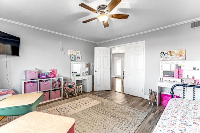 3377 N Bethel Ave, Sanger, CA 93657 - bedroom featuring ornamental molding, wood finished floors, and ceiling fan