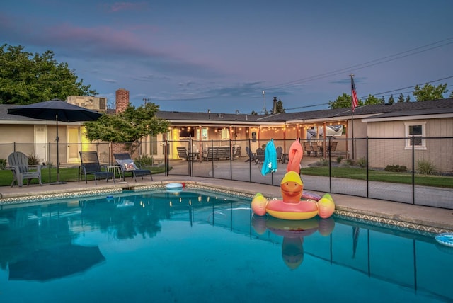 3377 N Bethel Ave, Sanger, CA 93657 - pool at dusk featuring a patio area
