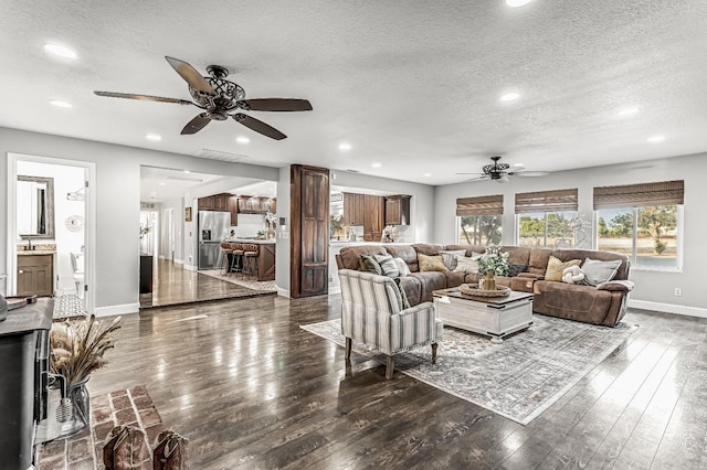 3377 N Bethel Ave, Sanger, CA 93657 - living area featuring ceiling fan, wood-type flooring, a textured ceiling, and recessed lighting