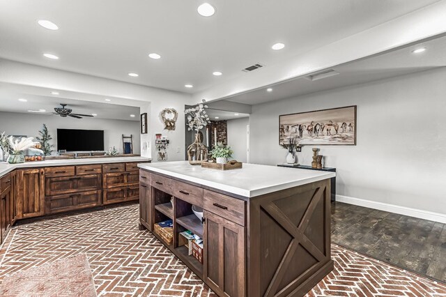3377 N Bethel Ave, Sanger, CA 93657 - kitchen with brick flooring, recessed lighting, light countertops, ceiling fan, and open shelves