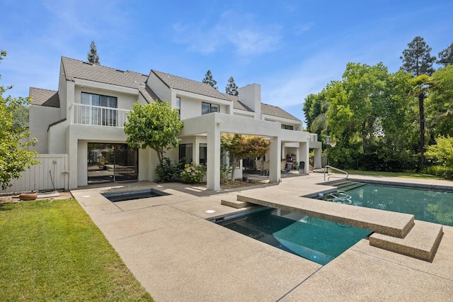 2734 W Bluff Ave, Fresno, CA 93711 - rear view of house with a patio area, stucco siding, an outdoor pool, and a yard
