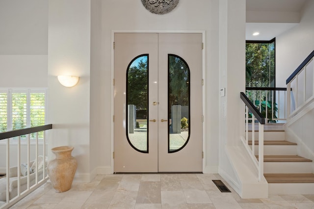 2734 W Bluff Ave, Fresno, CA 93711 - entryway featuring french doors and stairs