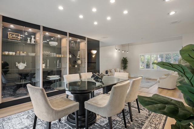2734 W Bluff Ave, Fresno, CA 93711 - dining space with wood finished floors and recessed lighting