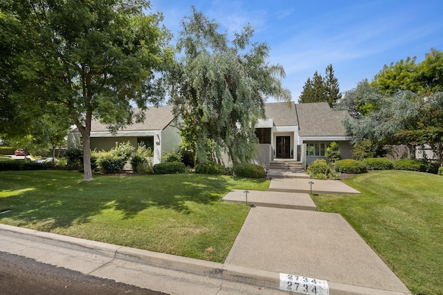 2734 W Bluff Ave, Fresno, CA 93711 - view of front of property with a front yard