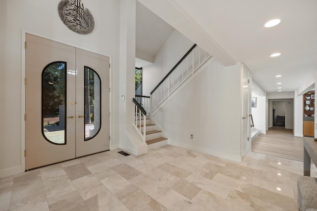2734 W Bluff Ave, Fresno, CA 93711 - entryway featuring stairway, french doors, and recessed lighting