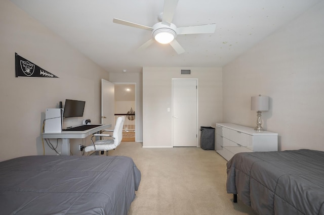 2734 W Bluff Ave, Fresno, CA 93711 - bedroom with light carpet, ceiling fan, and a desk